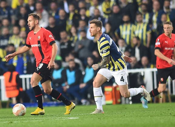Serdar Aziz 4 of Fenerbahce and Flavien Tait 20 of Stade Rennes during the UEFA Europa League group B match between Fenerbahce and Stade Rennes at Ulker Sukru Saracoglu Stadium in Istanbul, Turkey on October 27, 2022. ( Photo by Seskimphoto ) 