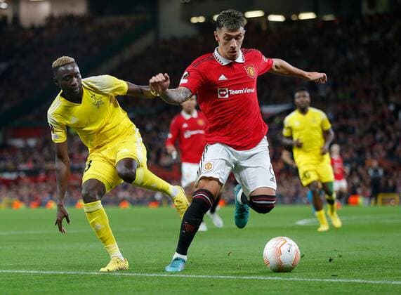 Mandatory Credit: Photo by Magi Haroun Shutterstock (13495235d) Lisandro Martinez of Manchester United, ManU and Mouhamed Diop of Sheriff Tiraspol Manchester United v Sheriff Tiraspol, UEFA Europa League, Group E, Football, Old Trafford, Manchester, UK - 27 Oct 2022 EDITORIAL USE ONLY No use with unauthorised audio, video, data, fixture lists, club league logos or live services. Online in-match use limited to 120 images, no video emulation. No use in betting, games or single club league player publications. Manchester United v Sheriff Tiraspol, UEFA Europa League, Group E, Football, Old Trafford, Manchester, UK - 27 Oct 2022 EDITORIAL USE ONLY No use with unauthorised audio, video, data, fixture lists, club league logos or live services. Online in-match use limited to 120 images, no video emulation. No use in betting, games or single club league player publications. Copyright: xMagixHaroun Shutterstockx 13495235d