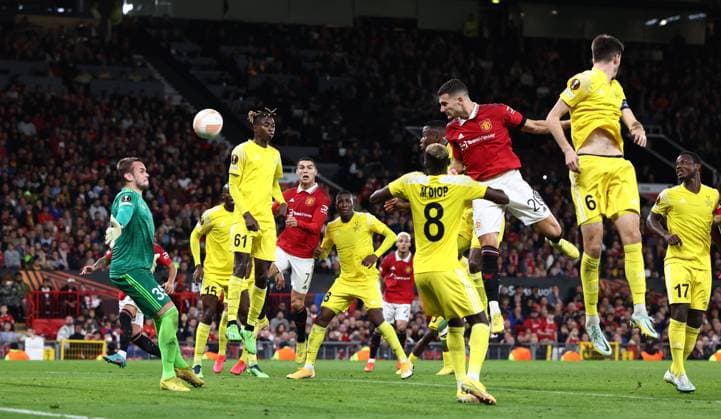 Manchester, England, 27th October 2022. Diogo Dalot of Manchester United, ManU heads the first goal during the UEFA Europa League match at Old Trafford, Manchester. Picture credit should read: Darren Staples Sportimage EDITORIAL USE ONLY. No use with unauthorised audio, video, data, fixture lists, club league logos or live services. Online in-match use limited to 120 images, no video emulation. No use in betting, games or single club league player publications. SPI-1993-0024