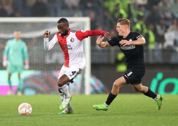 SOCCER - UEFA EL, Sturm vs Feyenoord GRAZ,AUSTRIA,27.OCT.22 - SOCCER - UEFA Europa League, group stage, SK Sturm Graz vs Feyenoord Rotterdam. Image shows Lutsharel Geertuida (Feyenoord) and Alexander Prass (Sturm).  GEPAxpictures xChrisxBauer