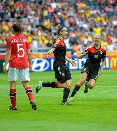 Germany s Anja Mittag, center, jubilates after scoring at Friend s Arena in Stockholm, Sweden, Saturday July 28, during the UEFA Women s Euro soccer final between Germany and Norway. STOCKHOLM SWEDEN Soccer xx