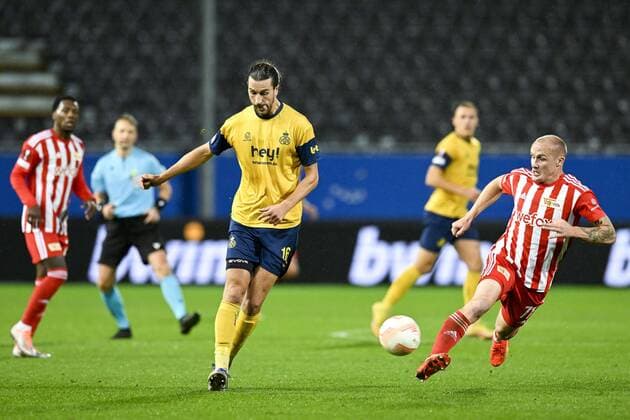 LEUVEN, BELGIUM - NOVEMBER 03 : Burgess Christian defender of Union St-Gilloise pictured in action with Michel Sven forward of Union Berlin during UEFA Europa league match between Union St-Gilloise and Union Berlin at the King Power Stadium at den Dreef November 3, 2022 in Leuven, Belgium, 3 11 2022 ( Union ST-Gilloise v Union Berlin PhotoNews Panoramic 