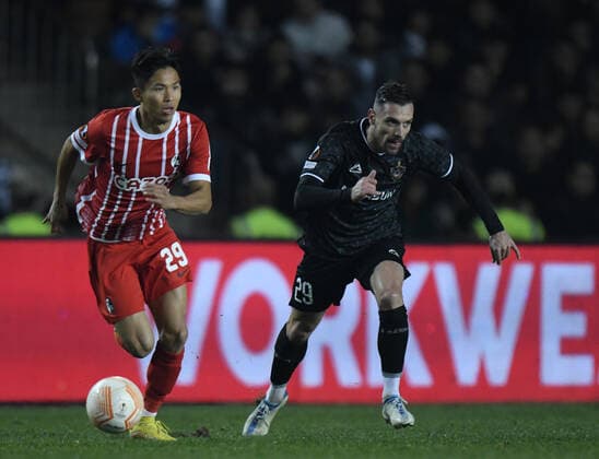 Marko Ve?ovi?? of Qaraba? FK chases Woo-Yeong Jeong of SC Freiburg during the UEFA Europa League Group G match between Qaraba? FK and SC Freiburg at The Tofiq Bahramov Republican Stadium in Baku, Azerbaijan  Copyright: xx