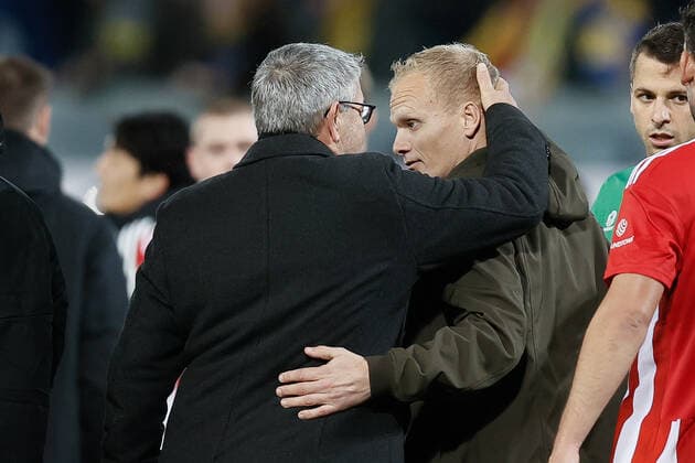 Berlin s head coach Urs Fischer and Union s head coach Karel Geraerts pictured after a soccer match between Belgian Royale Union Saint-Gilloise and German Union Berlin, Thursday 03 November 2022 in Leuven, on day 6 6 of the Uefa Europa League group stage. BRUNOxFAHY  x48598843x