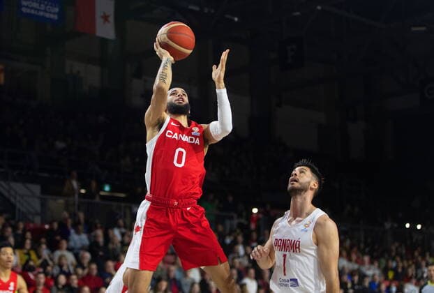 November 13, 2022, EDMONTON, AB, CANADA: Canada s Kassius Robertson (0) goes up for the shot as Panama s Eugenio Luzcando (1) defends during first half FIBA World Cup Qualifiers action in Edmonton, Sunday, Nov. 13, 2022. Canada News - November 13, 2022  - ZUMAc35_ 20221113_zaf_c35_139 Copyright: xJasonxFransonx