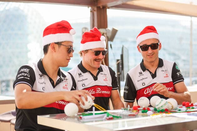 Bilder des Jahres, Sport 11 November Sport Themen der Woche KW46 Sport Bilder des Tages ZHOU Guanyu (chi), Alfa Romeo F1 Team ORLEN C42, BOTTAS Valtteri (fin), Alfa Romeo F1 Team ORLEN C42, KUBICA Robert (pol), Alfa Romeo F1 Team ORLEN C42, portrait during the Formula 1 Etihad Airways Abu Dhabi Grand Prix 2022, 22nd round of the 2022 FIA Formula One World Championship, WM, Weltmeisterschaft from November 18 to 20, 2022 on the Yas Marina Circuit, in Yas Island, Abu Dhabi - F1 - ABU DHABI GRAND PRIX 2022 DPPI Panoramic  00122049_AV6_5079