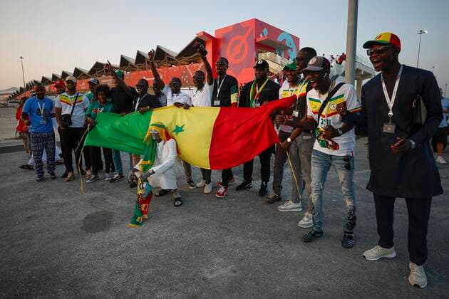 Senegalese fans celebrate as they arrive at Al Bayt Stadium to attend the opening game of FIFA World Cup, WM, Weltmeisterschaft, Fussball Qatar 2022 championship between Qatar and Ecuador, in Al Khor, Qatar, on 20 November 2022. Opening game of FIFA World Cup Qatar 2022 championship !ACHTUNG: NUR REDAKTIONELLE NUTZUNG!  Copyright: xJosexMendezx EVE231 20221120-2e5e2315a13b51433634d4b0cdfcddc2377e3945