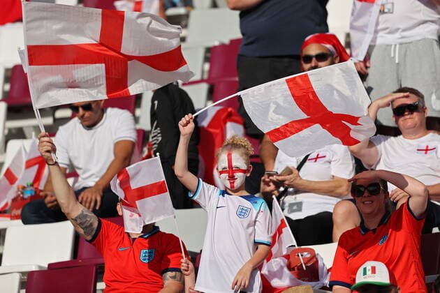 QATAR, DOHA - NOVEMBER 21, 2022: Team England supporters wave flags ahead of the 2022 FIFA World Cup, WM, Weltmeisterschaft, Fussball Group B football match between England and Iran at Khalifa International Stadium. Sergei Bobylev TASS  56004881