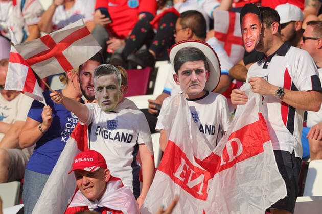 England fans wearing Jordan Pickford of England, Harry Maguire of England and Raheem Sterling of England masks during the FIFA World Cup, WM, Weltmeisterschaft, Fussball Qatar 2022 match between England and Iran at Khalifa International Stadium, Doha, Qatar on 21 November 2022. Copyright: xPeterxDovganx 34520094