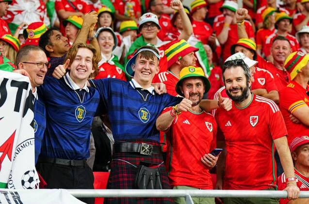 Mandatory Credit: Photo by Javier Garcia Shutterstock (13626388q) Scotland and Wales fans in the stands before the start of the match USA v Wales, FIFA World Cup, WM, Weltmeisterschaft, Fussball 2022, Group B, Football, Ahmad Bin Ali Stadium, Ar-Rayyan, Qatar - 21 Nov 2022 Editorial Use Only USA v Wales, FIFA World Cup 2022, Group B, Football, Ahmad Bin Ali Stadium, Ar-Rayyan, Qatar - 21 Nov 2022 Editorial Use Only  Copyright: xJavierxGarcia Shutterstockx 13626388q