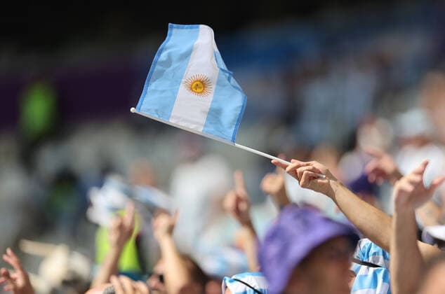 (221122) -- LUSAIL, Nov. 22, 2022 -- A fan waves Argentina s national flag before the Group C match between Argentina and Saudi Arabia at the 2022 FIFA World Cup, WM, Weltmeisterschaft, Fussball at Lusail Stadium in Lusail, Qatar, Nov. 22, 2022. ) (SP)QATAR-LUSAIL-2022 WORLD CUP-GROUP C-ARG VS KSA CaoxCan 