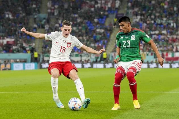 DOHA, 22-11-2022 Stadium 974, World Cup 2022 in Qatar game between Mexico vs Poland, Poland player Jakub Kaminski, Mexico player Jesus Gallardo Mexico - Poland  x19310793x Copyright: