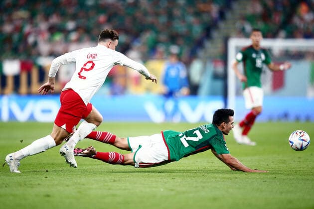 Mandatory Credit: Photo by Michael Zemanek Shutterstock (13626433v) Matty Cash of Poland and Hirving Lozano of Mexico. Mexico v Poland, FIFA World Cup, WM, Weltmeisterschaft, Fussball 2022, Group C, Football, Stadium 974, Doha, Qatar - 22 Nov 2022 Editorial Use Only Mexico v Poland, FIFA World Cup 2022, Group C, Football, Stadium 974, Doha, Qatar - 22 Nov 2022 Editorial Use Only Copyright: xMichaelxZemanek Shutterstockx 13626433v