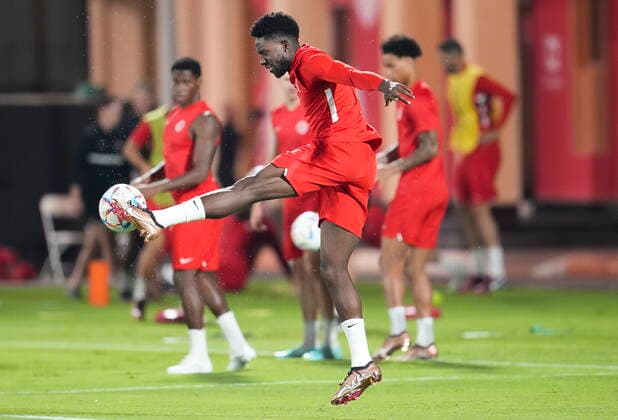 November 22, 2022, DOHA, QATAR: Canada forward Alphonso Davies kicks the ball during practice at the World Cup in Doha, Qatar, Tuesday, Nov. 22, 2022. Canada News - November 22, 2022  - ZUMAc35_ 20221122_zaf_c35_032 Copyright: xNathanxDenettex