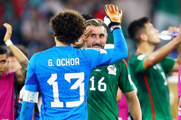 Mandatory Credit: Photo by Kieran McManus Shutterstock (13626428bx) Hector Herrera of Mexico salutes Goalkeeper Guillermo Ochoa of Mexico at full time after he saved a penalty. Mexico v Poland, FIFA World Cup, WM, Weltmeisterschaft, Fussball 2022, Group C, Football, Stadium 974, Doha, Qatar - 22 Nov 2022 Editorial Use Only Mexico v Poland, FIFA World Cup 2022, Group C, Football, Stadium 974, Doha, Qatar - 22 Nov 2022 Editorial Use Only  Copyright: xKieranxMcManus Shutterstockx 13626428bx