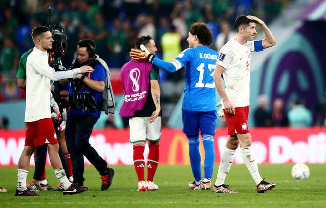 Mandatory Credit: Photo by Michael Zemanek Shutterstock (13626433ch) Robert Lewandowski of Poland at full time with Goalkeeper Guillermo Ochoa of Mexico beyond. Mexico v Poland, FIFA World Cup, WM, Weltmeisterschaft, Fussball 2022, Group C, Football, Stadium 974, Doha, Qatar - 22 Nov 2022 Editorial Use Only Mexico v Poland, FIFA World Cup 2022, Group C, Football, Stadium 974, Doha, Qatar - 22 Nov 2022 Editorial Use Only Copyright: xMichaelxZemanek Shutterstockx 13626433ch