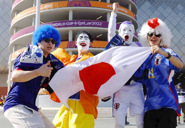 Football World Cup in Qatar Supporters of Japan cheer ahead of a World Cup Group E football match against Germany at Khalifa International Stadium in Doha on Nov. 23, 2022.  A14AA0001360645P 