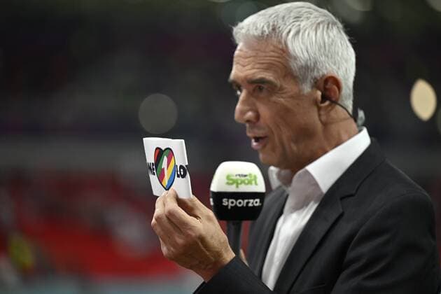 DOHA, QATAR - NOVEMBER 23 : Deprez Pierre (RTBF) with the armband Â« one love Â» during the FIFA World Cup, WM, Weltmeisterschaft, Fussball Qatar 2022 Groupe F match between Belgium and Canada at the Ahmad Bin Ali Stadium on November 23, 2022 in Doha, Qatar, 23 11 2022 ( Belgium v Canada - FIFA World Cup Qatar 2022 PhotoNews Panoramic 