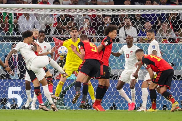 Belgium s Yannick Carrasco about to make a hand fault in front of Belgium s goalkeeper Thibaut Courtois at a soccer game between Belgium s national team, Nationalteam the Red Devils and Canada, in Group F of the FIFA 2022 World Cup in Al Rayyan, State of Qatar on Wednesday 23 November 2022. VIRGINIExLEFOUR  x53206423x