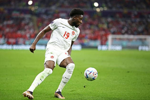 QAT: Belgium-Canada. Qatar 2022 World Cup. Alphonso Davies do Canada during the Qatar 2022 World Cup match, group F, date 1, between Belgium and Canada played at Ahmad Ben Ali Stadium on Nov 23, 2022 in Ar-Rayyan, Qatar. kpng Copyright: xPRESSINPHOTOx WC_221123_1017
