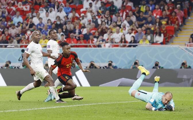 Football World Cup in Qatar Belgium s Michy Batshuayi (red) scores the team s opening goal in the first half of a World Cup Group F match against Canada at Ahmad Bin Ali Stadium in Al Rayyan, Qatar, on Nov. 23, 2022.  A14AA0001361313P 