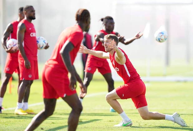 November 24, 2022, DOHA, QATAR: Canada midfielder David Wotherspoon, right, reacts in a drill during practice at the World Cup in Doha, Qatar during on Thursday, November 24, 2022. Canada News - November 24, 2022  - ZUMAc35_ 20221124_zaf_c35_008 Copyright: xNathanxDenettex