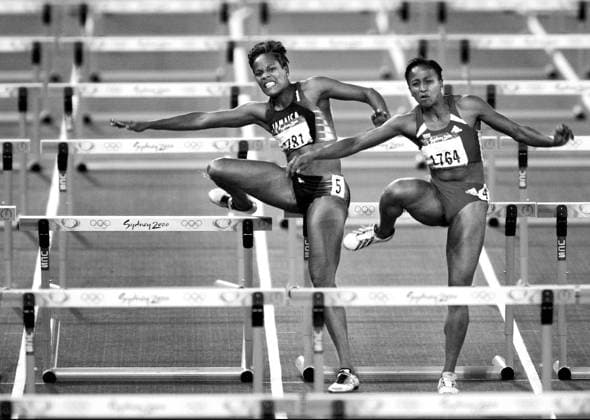 SYDNEY 000927 - OS i Sydney 2000, 100 meter häck final fr v Brigitte Foster, Jamaica och Nicole Ramalalanirinas, Frankrike. SYDNEY AUSTRALIEN Övriga sporter x599x *** SYDNEY 000927 Sydney 2000 Olympics, 100m hurdles final fr v Brigitte Foster, Jamaica and Nicole Ramalalanirinas, France SYDNEY AUSTRALIA Other sports x599x  Copyright: xJonasxLindkvistx
