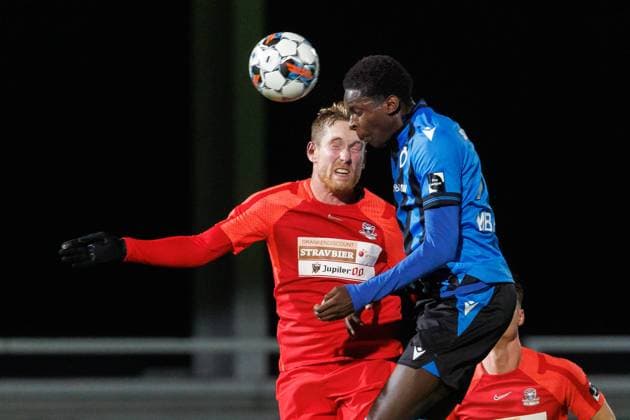 Dender s Michael Lallemand and Club NXT s Noah Mbamba fight for the ball during a soccer match between Club NXT (U23) and Dender EH, Friday 25 November 2022 in Roeselare, on day 15 of the 2022-2023 Challenger Pro League 1B second division of the Belgian championship. KURTxDESPLENTER  x53752050x