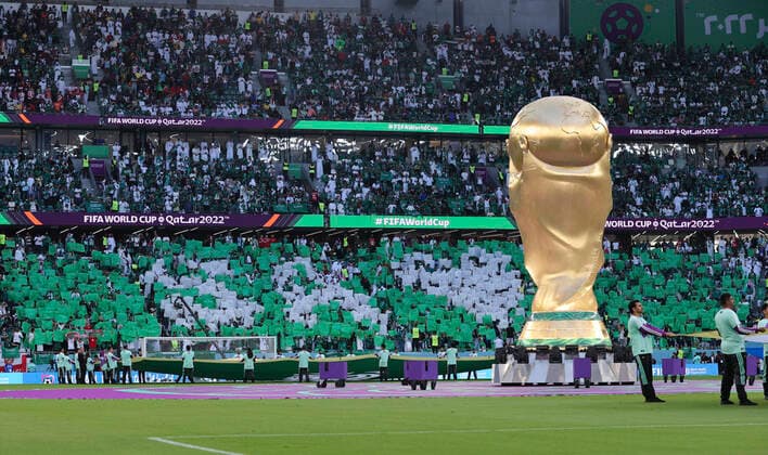 Poland v Saudi Arabia 2022 FIFA World Cup, WM, Weltmeisterschaft, Fussball Saudi Arabia fans with a replica of the FIFA World Cup trophy in front of them before the 2022 FIFA World Cup Group C match at Education City Stadium, Doha Content Not Available For UK Newspapers Copyright: xPaulxChestertonx FIL-17647-0015 UK Newspapers OUT