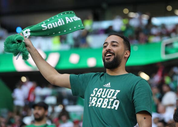 26th November 2022; Education City Stadium, Al Rayyan, Qatar; FIFA World Cup, WM, Weltmeisterschaft, Fussball Football, Poland versus Saudi Arabia; Saudi Arabia fan waves his scarf  ActionPlus12452900 JohnxPatrickxFletcher Content restricted for UK based newspaper
