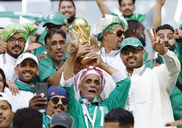 Football World Cup in Qatar Saudi Arabia supporters cheer ahead of a World Cup Group C football match against Poland at Education City Stadium in Al Rayyan, Qatar, on Nov. 26, 2022.  A14AA0001363389P 