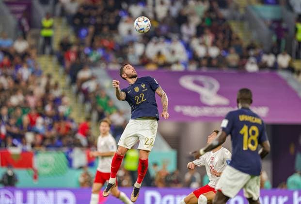 France v Denmark 2022 FIFA World Cup, WM, Weltmeisterschaft, Fussball 26 11 2022. Match 23 Theo Hernandez (22) of France heads the ball during the 2022 Fifa World Cup match between France and Denmark at Stadium 974, Doha, Qatar on 26 November 2022. Editorial use only , Copyright: xNigelxKeenex PSI-16410-0021