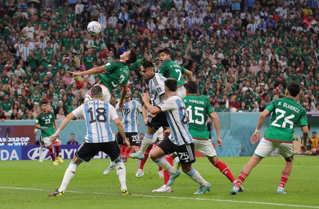 Argentina v Mexico 2022 FIFA World Cup, WM, Weltmeisterschaft, Fussball Lautaro Martinez of Argentina and Cesar Montes of Mexico compete at a corner during the 2022 FIFA World Cup Group C match at Lusail Stadium, Lusail Content Not Available For UK Newspapers Copyright: xPaulxChestertonx FIL-17646-0063 UK Newspapers OUT