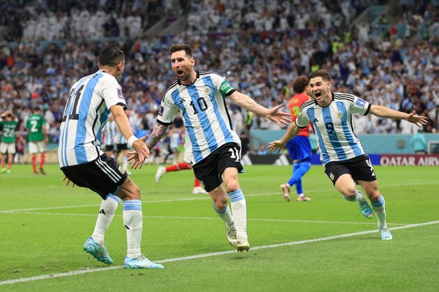 Football - FIFA World Cup, WM, Weltmeisterschaft, Fussball - Group C - Argentina v Mexico 26th November 2022 - FIFA World Cup - Group C - Argentina v Mexico - Lionel Messi of Argentina celebrates their first goal with Angel Di Maria of Argentina and Julian Alvarez of Argentina - Photo: Simon Stacpoole Offside. Doha Qatar Copyright: xSimonxStacpoolexOffside