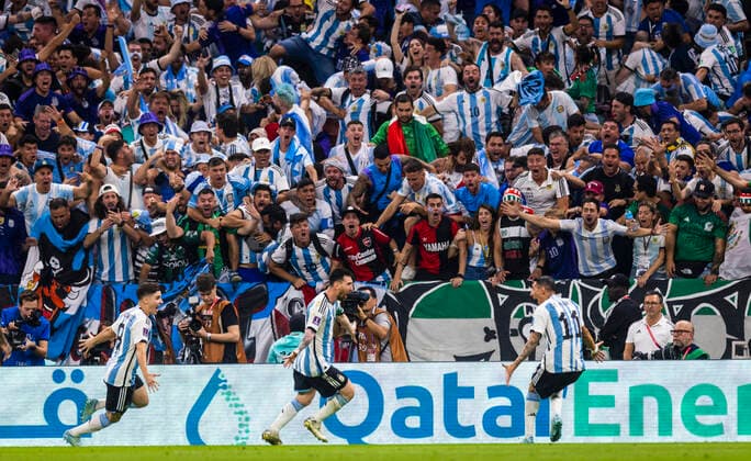 Doha, Qatar. 26th Nov, 2022. Lionel Messi (Arg) and Angel Di Maria (Arg) cheers in front of the fan block Argentina - Mexico World Cup 2022 in Qatar 26.11.2022 Credit: Moritz Müller