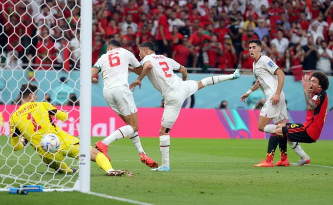 Moroccan Achraf Hakimi scores a goal and Belgium s goalkeeper Thibaut Courtois can not stop it but it was cancelled after a VAR checking during a soccer game between Belgium s national team, Nationalteam the Red Devils and Morocco, in Group F of the FIFA 2022 World Cup in Al Thumama Stadium, Doha, State of Qatar on Sunday 27 November 2022. VIRGINIExLEFOUR  x54141661x