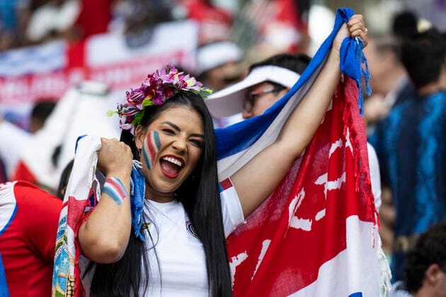 DOHA, QATAR - NOVEMBER 27: A female Costa Rica fan holds up a flag during the FIFA World Cup, WM, Weltmeisterschaft, Fussball Qatar 2022 Group E match between Japan and Costa Rica at Ahmad Bin Ali Stadium on November 27, 2022 in Doha, Qatar. (Photo by Sebastian Frej) WCS  Copyright: xSebastianxFrej