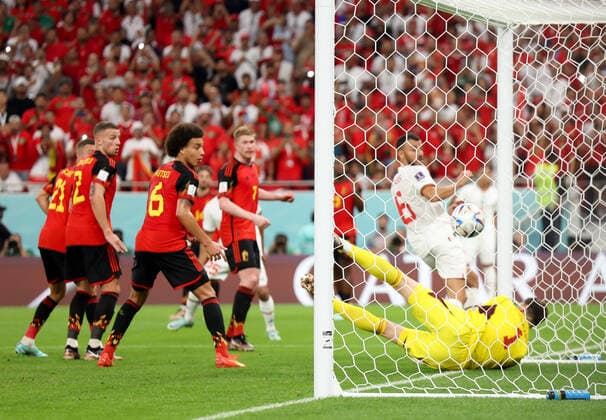 (221127) -- DOHA, Nov. 27, 2022 -- Thibaut Courtois (bottom), goalkeeper of Belgium, fails to save during the Group F match between Belgium and Morocco at the 2022 FIFA World Cup, WM, Weltmeisterschaft, Fussball at Al Thumama Stadium in Doha, Qatar, Nov. 27, 2022. ) (SP)QATAR-DOHA-2022 WORLD CUP-GROUP F-BEL VS MAR ZhengxHuansong 