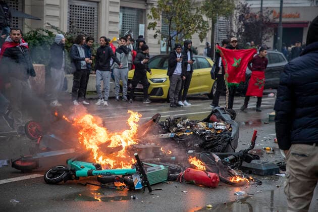 Illustration picture shows incidents during the celebrations of Moroccan supporters and police forces present in the center of Brussels, during a soccer game between Belgium s national team, Nationalteam the Red Devils and Morocco, in Group F of the FIFA 2022 World Cup, on Sunday 27 November 2022. NICOLASxMAETERLINCK  x54153237x