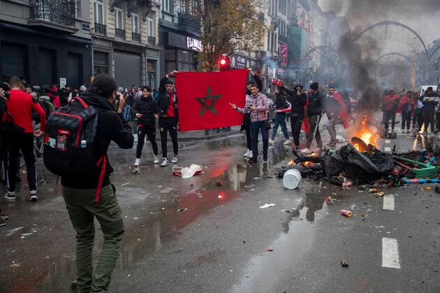 Illustration picture shows incidents during the celebrations of Moroccan supporters and police forces present in the center of Brussels, during a soccer game between Belgium s national team, Nationalteam the Red Devils and Morocco, in Group F of the FIFA 2022 World Cup, on Sunday 27 November 2022. NICOLASxMAETERLINCK  x54153239x