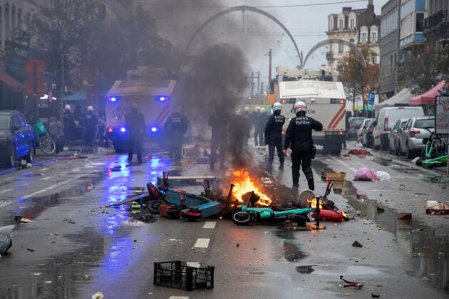 Illustration picture shows incidents during the celebrations of Moroccan supporters and police forces present in the center of Brussels, during a soccer game between Belgium s national team, Nationalteam the Red Devils and Morocco, in Group F of the FIFA 2022 World Cup, on Sunday 27 November 2022. NICOLASxMAETERLINCK  x54153241x