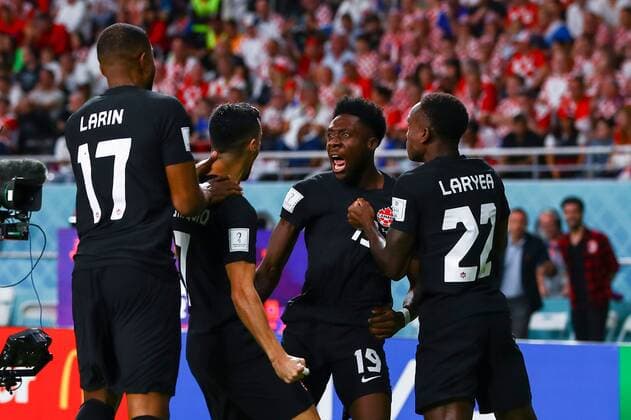 Mandatory Credit: Photo by Kieran McManus Shutterstock (13634907v) Alphonso Davies of Canada scores and celebrates 0-1 Croatia v Canada, FIFA World Cup, WM, Weltmeisterschaft, Fussball 2022, Group F, Football, Khalifa International Stadium, Ar-Rayyan, Qatar - 27 Nov 2022 Editorial Use Only Croatia v Canada, FIFA World Cup 2022, Group F, Football, Khalifa International Stadium, Ar-Rayyan, Qatar - 27 Nov 2022 Editorial Use Only Copyright: xKieranxMcManus Shutterstockx 13634907v