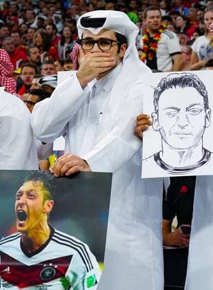 Mandatory Credit: Photo by Javier Garcia Shutterstock (13634885x) Fans protest with pictures of Mesut Ozil Spain v Germany, FIFA World Cup, WM, Weltmeisterschaft, Fussball 2022, Group E, Football, Al Bayt Stadium, Al Khor, Qatar - 27 Nov 2022 Editorial Use Only Spain v Germany, FIFA World Cup 2022, Group E, Football, Al Bayt Stadium, Al Khor, Qatar - 27 Nov 2022 Editorial Use Only  Copyright: xJavierxGarcia Shutterstockx 13634885x