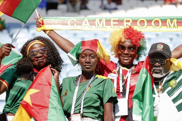 Football World Cup in Qatar Cameroon fans clad in the country s green, red and yellow colors pose for a photo prior to the start of a World Cup Group G football game against Serbia at Al Janoub Stadium in Al Wakrah, Qatar on Nov. 28, 2022.  A14AA0001364983P 