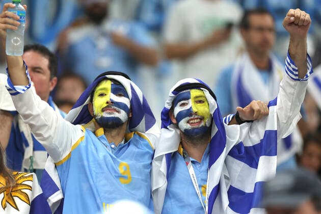 (221128) -- LUSAIL, Nov. 28, 2022 -- Fans cheer prior to the Group H match between Portugal and Uruguay at the 2022 FIFA World Cup, WM, Weltmeisterschaft, Fussball at Lusail Stadium in Lusail, Qatar, Nov. 28, 2022. ) (SP)QATAR-LUSAIL-2022 WORLD CUP-GROUP H-POR VS URU HanxYan 