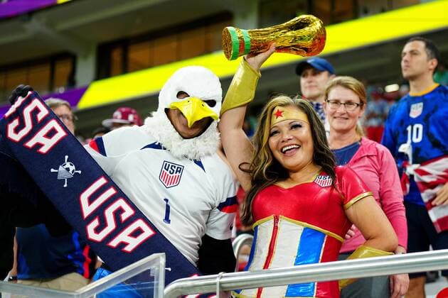 Mandatory Credit: Photo by Javier Garcia Shutterstock (13640318y) A USA fan dressed as Wonder Woman with a replica World Cup trophy. Iran v USA, FIFA World Cup, WM, Weltmeisterschaft, Fussball 2022, Group B, Football, Al Thumama Stadium, Doha, Qatar - 29 Nov 2022 Editorial Use Only Iran v USA, FIFA World Cup 2022, Group B, Football, Al Thumama Stadium, Doha, Qatar - 29 Nov 2022 Editorial Use Only  Copyright: xJavierxGarcia Shutterstockx 13640318y