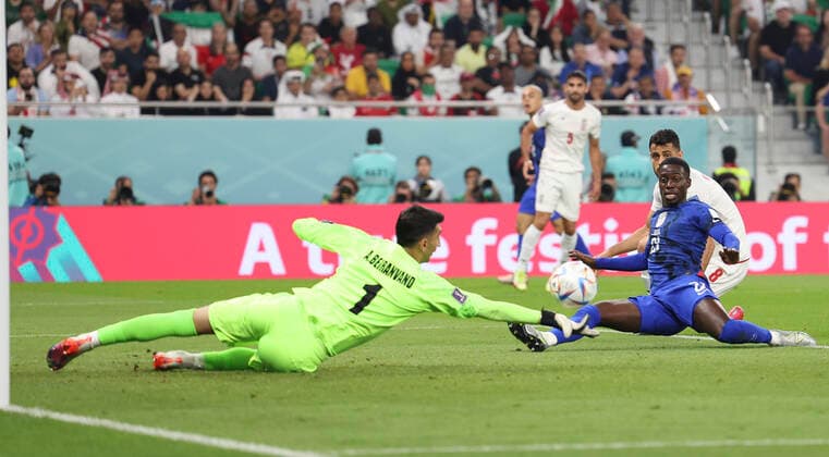 (221129) -- DOHA, Nov. 29, 2022 -- Timothy Weah (Front R) of the United States shoots the Group B match between Iran and the United States at the 2022 FIFA World Cup, WM, Weltmeisterschaft, Fussball at Al Thumama Stadium in Doha, Qatar, Nov. 29, 2022. ) (SP)QATAR-DOHA-2022 WORLD CUP-GROUP B-IRN VS USA CaoxCan 