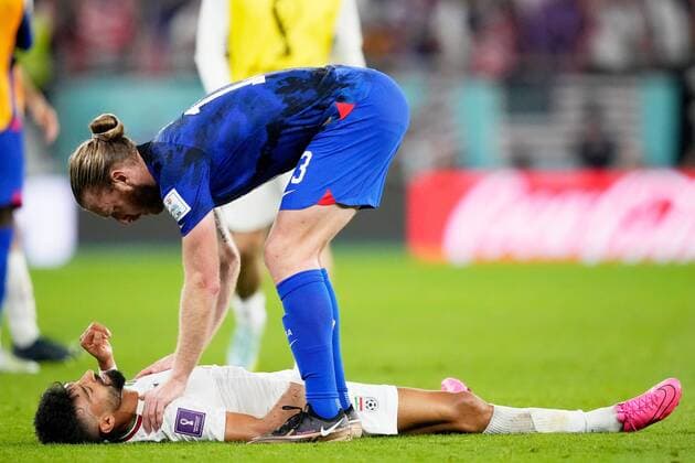 Mandatory Credit: Photo by Dave Shopland Shutterstock (13640320dm) Tim Ream of the USA with Ramin Rezaeian of Iran at full time. Iran v USA, FIFA World Cup, WM, Weltmeisterschaft, Fussball 2022, Group B, Football, Al Thumama Stadium, Doha, Qatar - 29 Nov 2022 Editorial Use Only Iran v USA, FIFA World Cup 2022, Group B, Football, Al Thumama Stadium, Doha, Qatar - 29 Nov 2022 Editorial Use Only  Copyright: xDavexShopland Shutterstockx 13640320dm