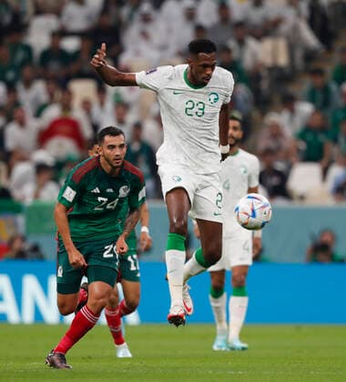 Saudi Arabia v Mexico 2022 FIFA World Cup, WM, Weltmeisterschaft, Fussball Luis Chavez of Mexico chases Mohamed Kanno of Saudi Arabia during the 2022 FIFA World Cup Group C match at Lusail Stadium, Lusail Content Not Available For UK Newspapers Copyright: xPaulxChestertonx FIL-17655-0064 UK Newspapers OUT
