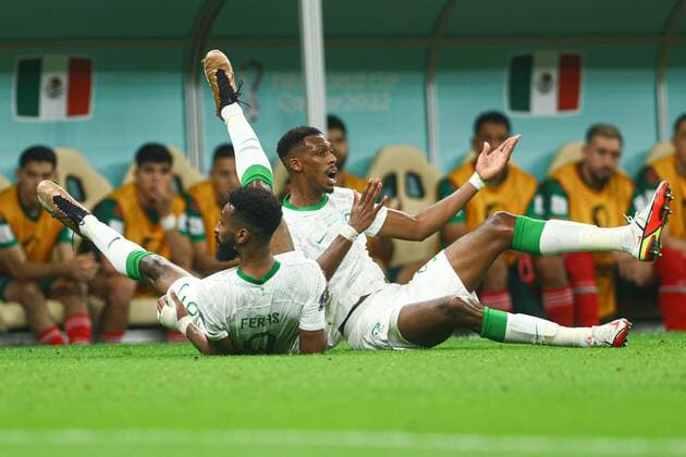 Mandatory Credit: Photo by Kieran McManus Shutterstock (13640351j) Firas Al-Buraikan of Saudi Arabia and Mohamed Kanno on the floor Saudi Arabia v Mexico, FIFA World Cup, WM, Weltmeisterschaft, Fussball 2022, Group C, Football, Lusail Stadium, Al Daayen, Qatar - 30 Nov 2022 Editorial Use Only Saudi Arabia v Mexico, FIFA World Cup 2022, Group C, Football, Lusail Stadium, Al Daayen, Qatar - 30 Nov 2022 Editorial Use Only  Copyright: xKieranxMcManus Shutterstockx 13640351j